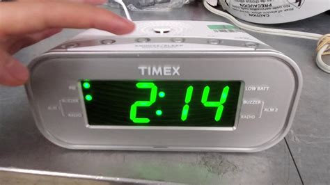 Keep unit connected to AC power when changing batteries to avoid losing your settings. . How to set time on timex t2312 alarm clock